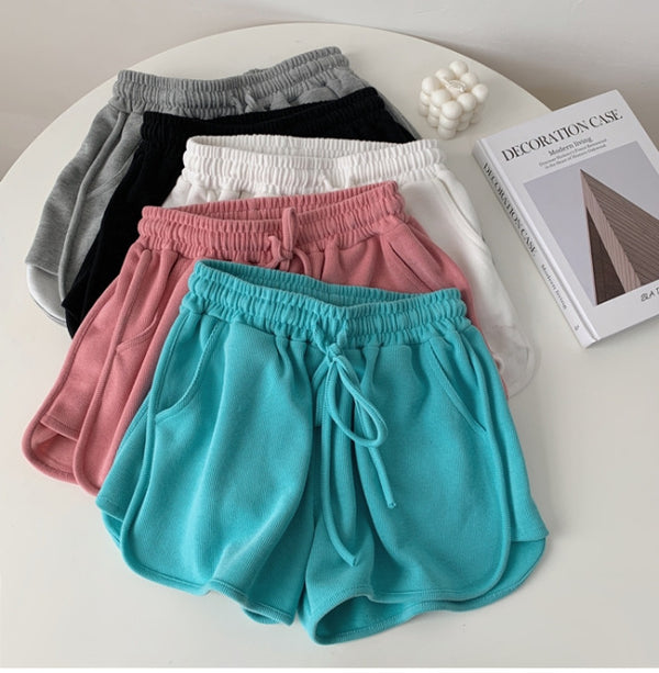 Shorts Deportivos de Pierna Ancha con Ajuste Versátil