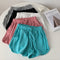 Shorts Deportivos de Pierna Ancha con Ajuste Versátil