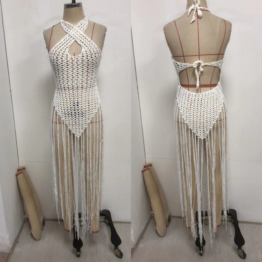 Black crochet beach cover-up with a cross-collar halter neckline and long fringe tassels, worn over a bikini. - Image 14