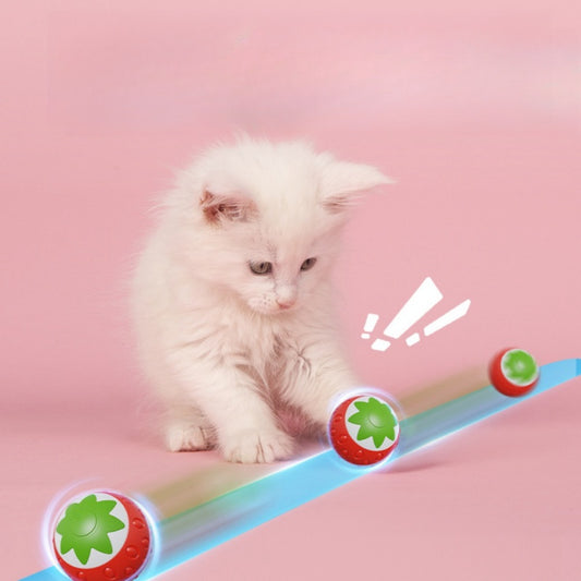 Green electric pet toy ball with a textured surface and a white strawberry-like design featuring a power button.
