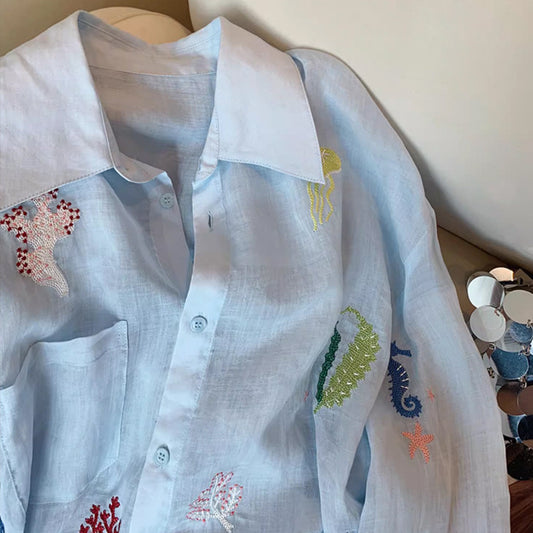 Blusa de Protección Solar con Bordado Floral para Mujer - Image 2