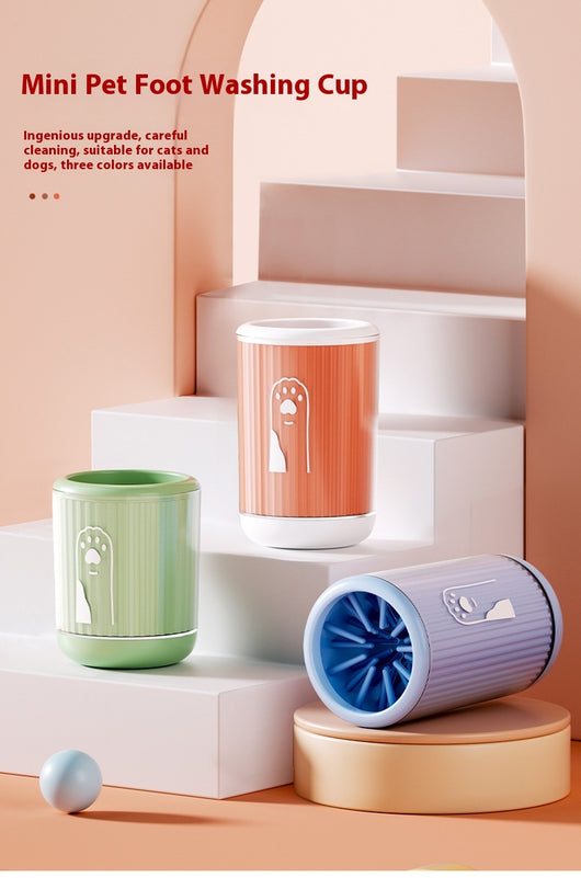 Light blue pet foot washing cup with a white paw print design, ribbed texture, and smooth base. - Image 26
