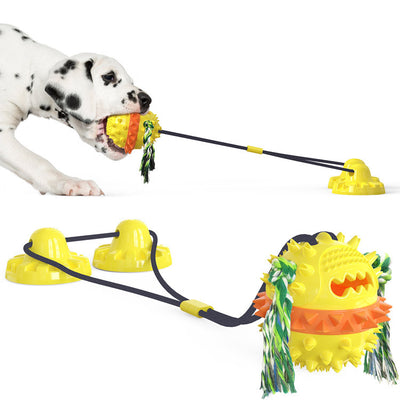 Red, white, and blue textured dog chew toy with rope tassels and a blue suction cup base, shown with a Dalmatian puppy playing. - Image 9