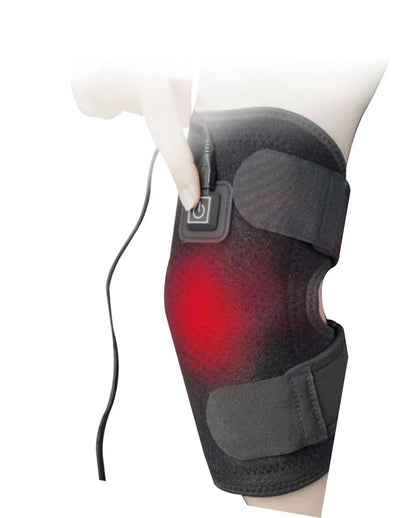 Black electric heating kneecap cover with hot compress massage, shown on a leg with a hand pressing the power button, indicating heat. - Image 15
