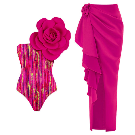 Black one-piece swimsuit with a large 3D flower on one shoulder and a geometric pattern on the bodice. - Image 10