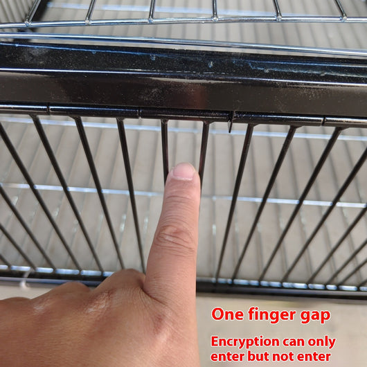 Black wire pigeon cage with a flat top and bottom, designed for one-way entry, shown on a gray surface. - Image 7