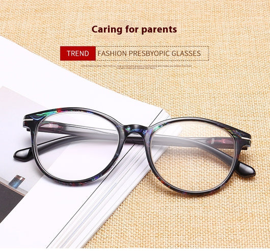 Four pairs of anti-blue light reading glasses with colorful full-rim frames in pink, tea, blue, and violet patterns. - Image 12