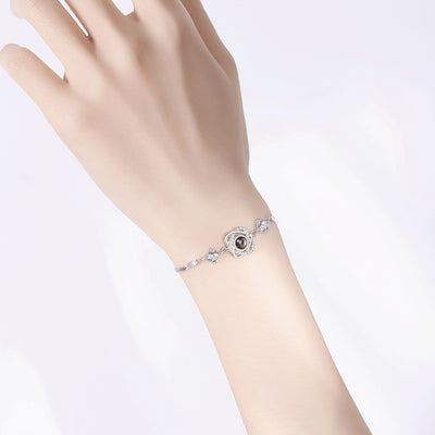 Pulsera de Plata con Doble Corazón y Proyección para Mujer