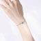 Pulsera de Plata con Doble Corazón y Proyección para Mujer
