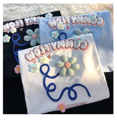 Playera Estampada con Letras Florales y Espuma - Image 18