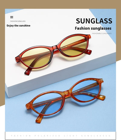 Retro fashion small frame sunglasses with translucent brown frames and yellow oval lenses, viewed from an angle. - Image 24