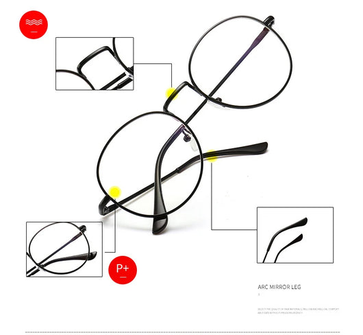 Black round anti-blue light glasses with clear lenses showing a blue reflection, resting on a gray textured surface. - Image 6