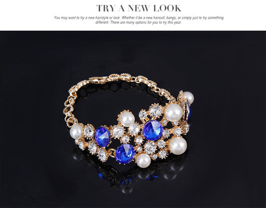 Four-piece bridal jewelry set with gold-toned necklace, earrings, bracelet, and ring, featuring amber and clear rhinestones with faux pearls. - Image 13