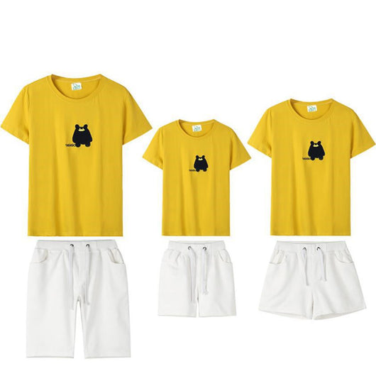 Yellow short-sleeve t-shirt with a black cartoon bear graphic and '100090' text on the front. - Image 2
