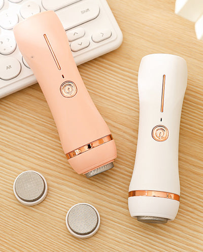 Orange pink portable electric foot grinder with a matte finish and rose gold accents, featuring a power button and grinding head. - Image 4