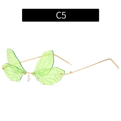 Light green rimless butterfly sunglasses with gold metal frames, featuring a unique veined lens design. - Image 9