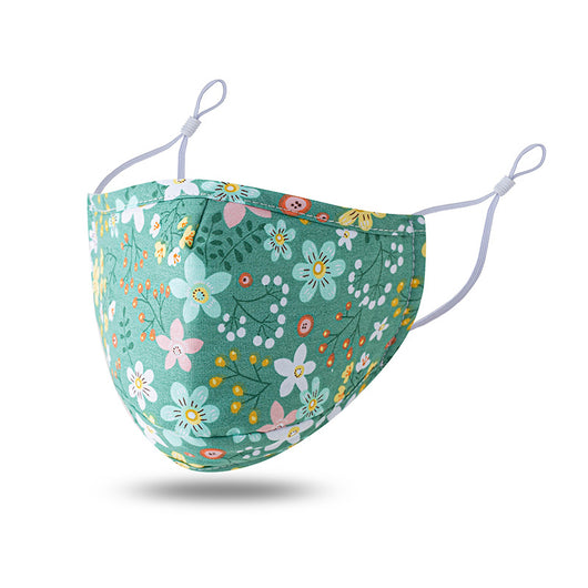 Teal cotton face mask with white floral pattern and brown leaves, featuring adjustable white ear loops. - Image 4