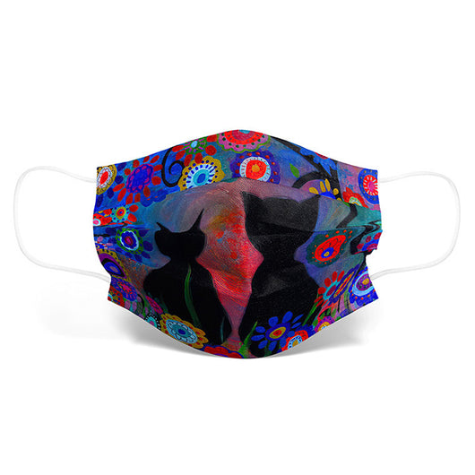 Disposable face mask with a colorful, artistic cartoon cat print and white ear loops. - Image 11