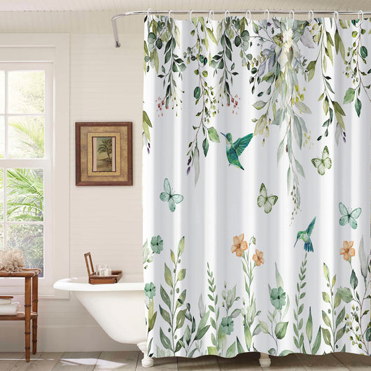 White shower curtain with a vibrant green botanical leaf print, hanging in a bright, modern bathroom. - Image 3
