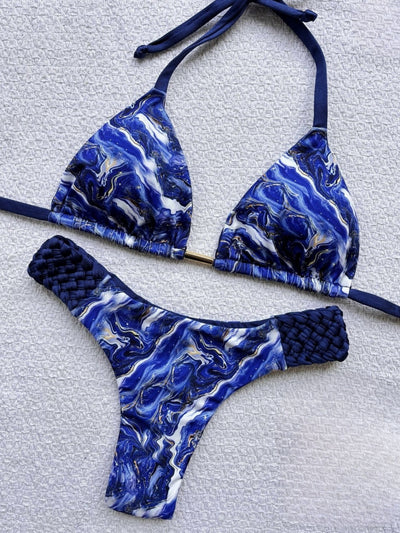 Women's blue, white, and gold marble print bikini with a triangle halter top and braided rope side details. - Image 6