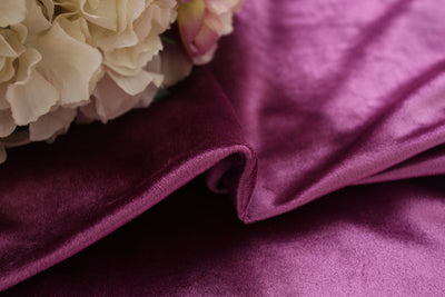 Close-up of draped purple Italian velvet fabric with soft folds and a subtle sheen, suitable for curtains. - Image 2
