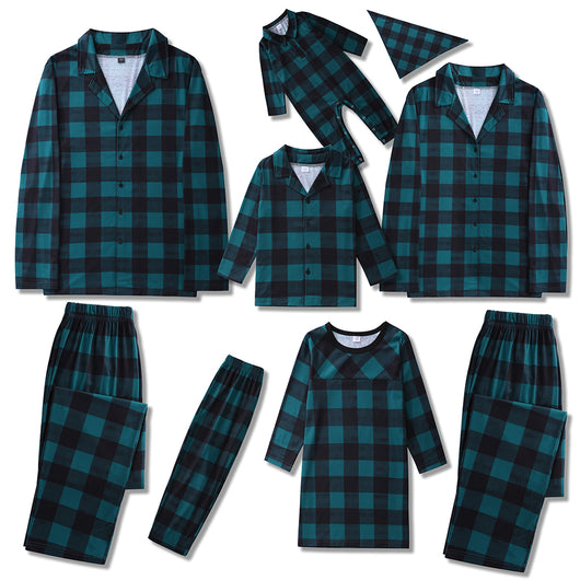 Family of four and dog wearing matching green and black plaid pajamas. Mother and father in two-piece sets, girl in dress, baby in two-piece, and dog in bandana - Image 3