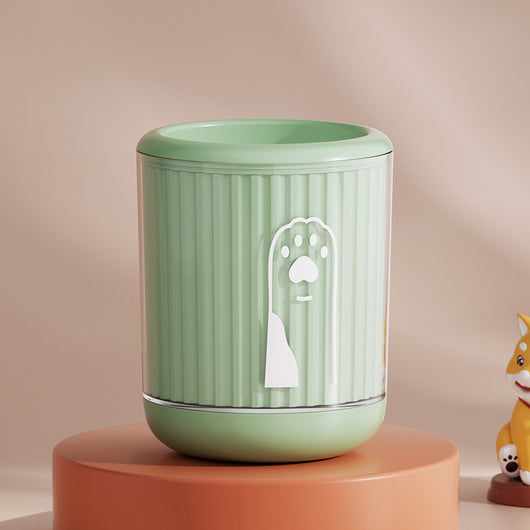 Light blue pet foot washing cup with a white paw print design, ribbed texture, and smooth base. - Image 17