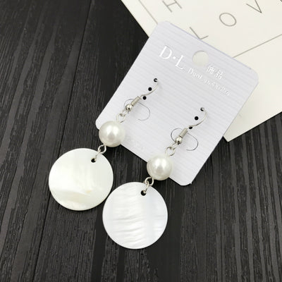 Aretes Coreanos Asimétricos con Flor de Perla y Moño - Image 48