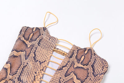Vestido Ajustado con Falda Cadera Estampado Serpiente y Detalles Calados - Image 10