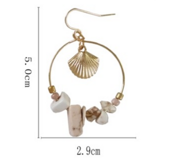 Aretes Estrella de Cinco Puntas en Metal Salvaje con Concha Marina - Image 8