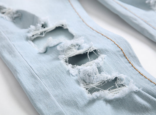 Jeans Slim Fit Azul y Blanco con Diseño de Agujeros Grandes - Importación - Image 7