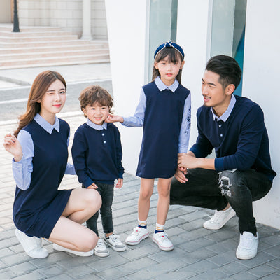 Family of four in matching maroon and striped outfits, including father, mother, son, and daughter. - Image 18