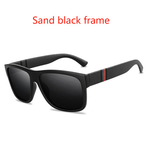 Men's grey plastic frame driving sunglasses with dark polarized lenses and red and black stripe detail on temples. - Image 13