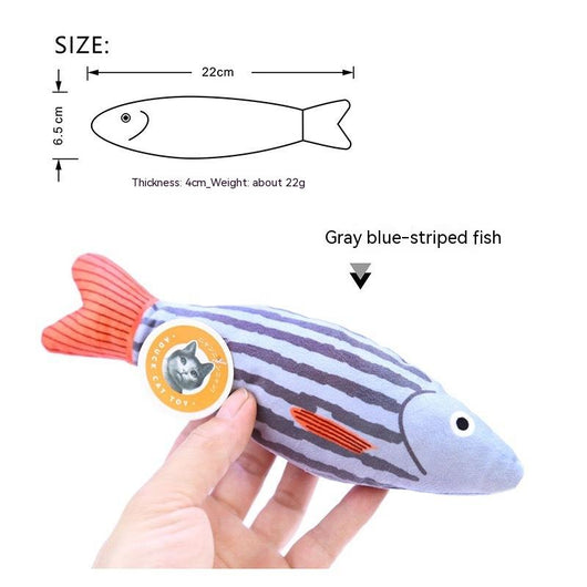 Orange fish-shaped plush catnip toy with blue fins and tail, held in a hand, with a small round tag. - Image 22