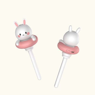 Two white and pink rabbit-shaped mini portable humidifiers, one facing forward and one showing the USB port. - Image 3