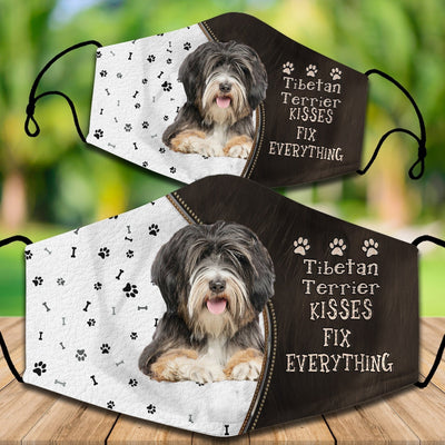 Two cotton face masks with a Bichon Frise dog, paw prints, and bones on a white and brown background. Text reads "Bichon Frise KISSES FIX EVERYTHING." - Image 65