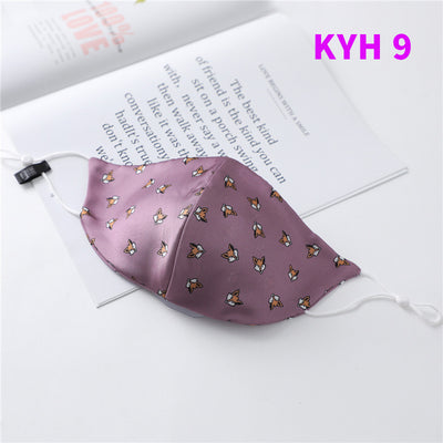 White silk face mask with light blue floral pattern and adjustable ear loops for women's sun protection. - Image 29