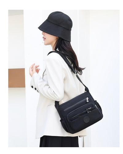 Bolsa Crossbody de Nylon Ligera con Gran Capacidad - Image 25