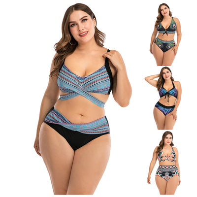 Plus size two-piece swimsuit with a black base, colorful geometric pattern, criss-cross top, and high-waisted bottom.