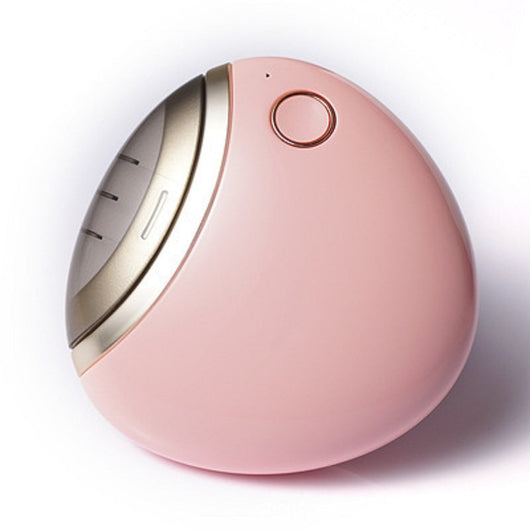 White egg-shaped electric nail clippers trimmer with a gold-toned accent and a single control button. - Image 20