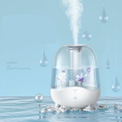White and clear household silent air humidifier emitting mist, with lemon slices visible in the transparent water tank. - Image 3