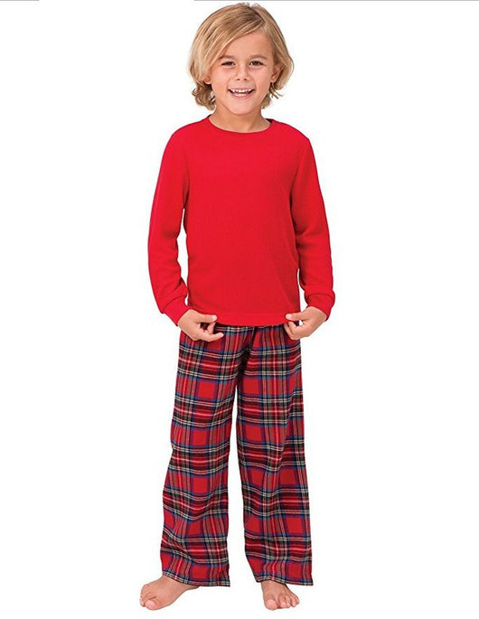Man wearing a red long-sleeve pajama top and red plaid pajama pants, suitable for Christmas or holiday loungewear. - Image 6