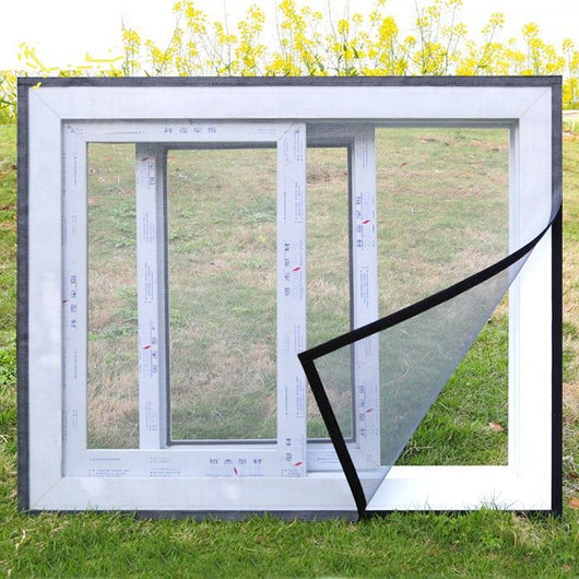 White mosquito screen applied to a window, with a hand gently pulling a corner to show its fine mesh texture. - Image 4