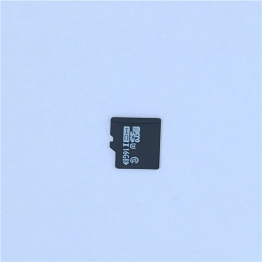 White A9 WIFI wireless network camera with a black lens, shown next to a black 32GB microSD card. - Image 7