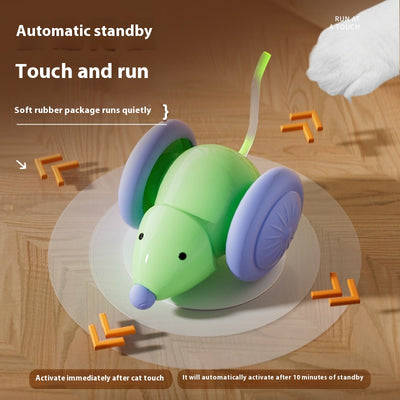 Green and purple electric mouse car cat toy with a glowing tail on a woven mat, designed for interactive play. - Image 4