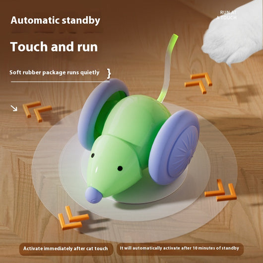 Green and purple electric mouse car cat toy with a glowing tail on a woven mat, designed for interactive play. - Image 4