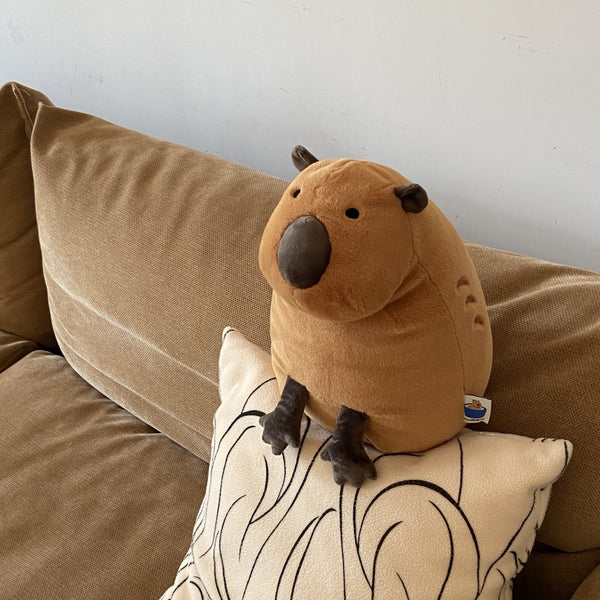 Muñeca Peluche Adorable con Capa de Agua