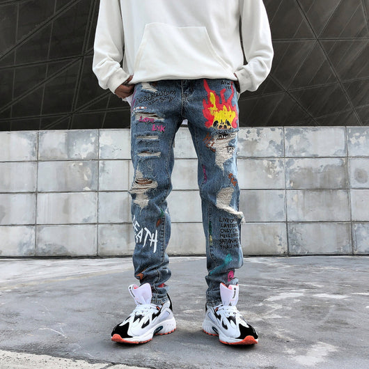 Jeans Rotos con Estampado Graffiti