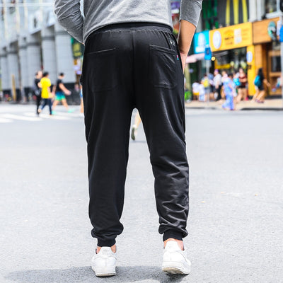 Pantalones de Color Sólido con Tecnología de Soporte Plus - Image 3
