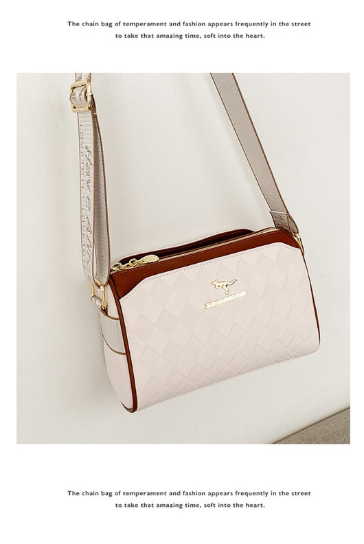 Bolsa Mensajera de Cuero con Detalles en Relieve - Elegancia Minimalista - Image 9